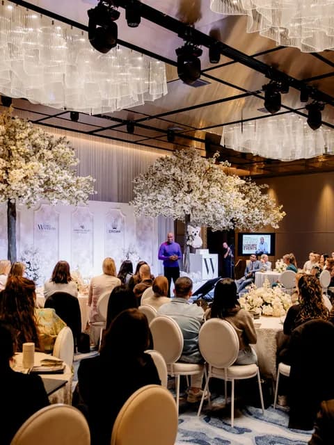 An audience at a wedding industry workshop
