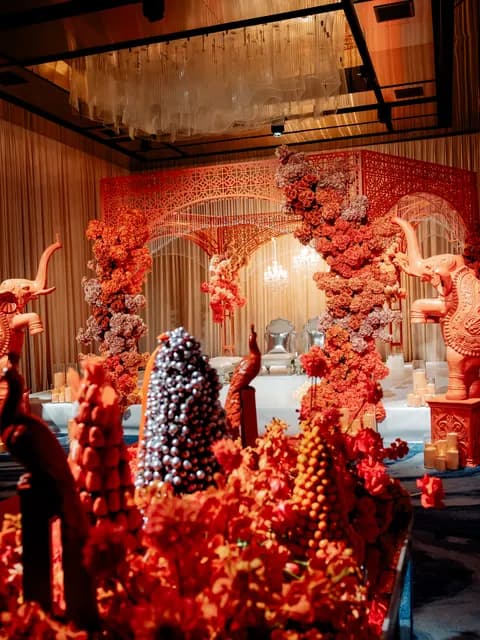 An elaborate floral installation styled for a wedding reception